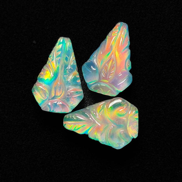 Handcaverd Crystal And Aurora Opal Doublets Lot