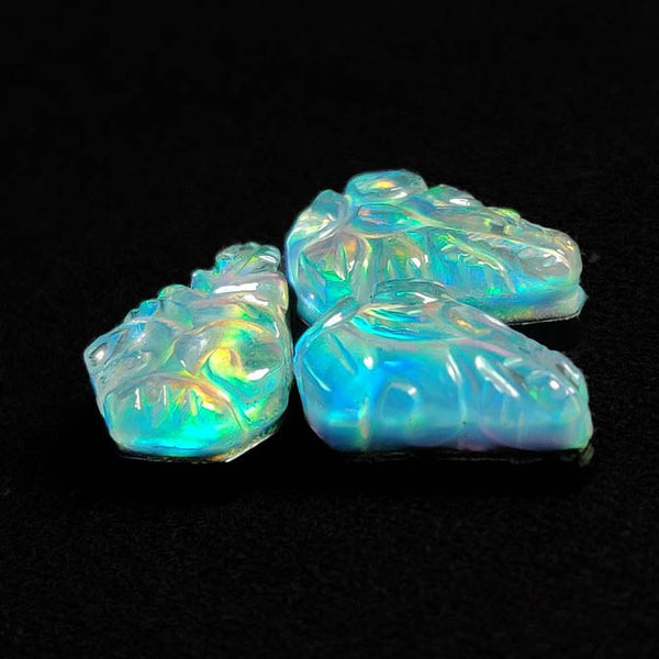 Handcaverd Crystal And Aurora Opal Doublets Lot