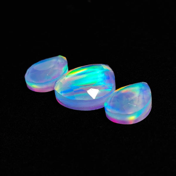 Faceted Crystal And Aurora Opal Doublets Lot