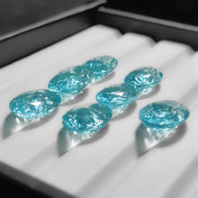 Reverse Intaglio Sky Blue Topaz Carving Lot