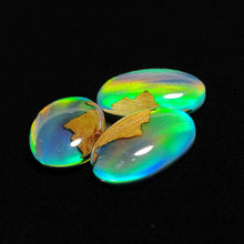 Handcarved Aurora Opal Doublets and Crystal Doublets