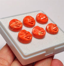 Handcarved Synthetic Coral Moonface Lot